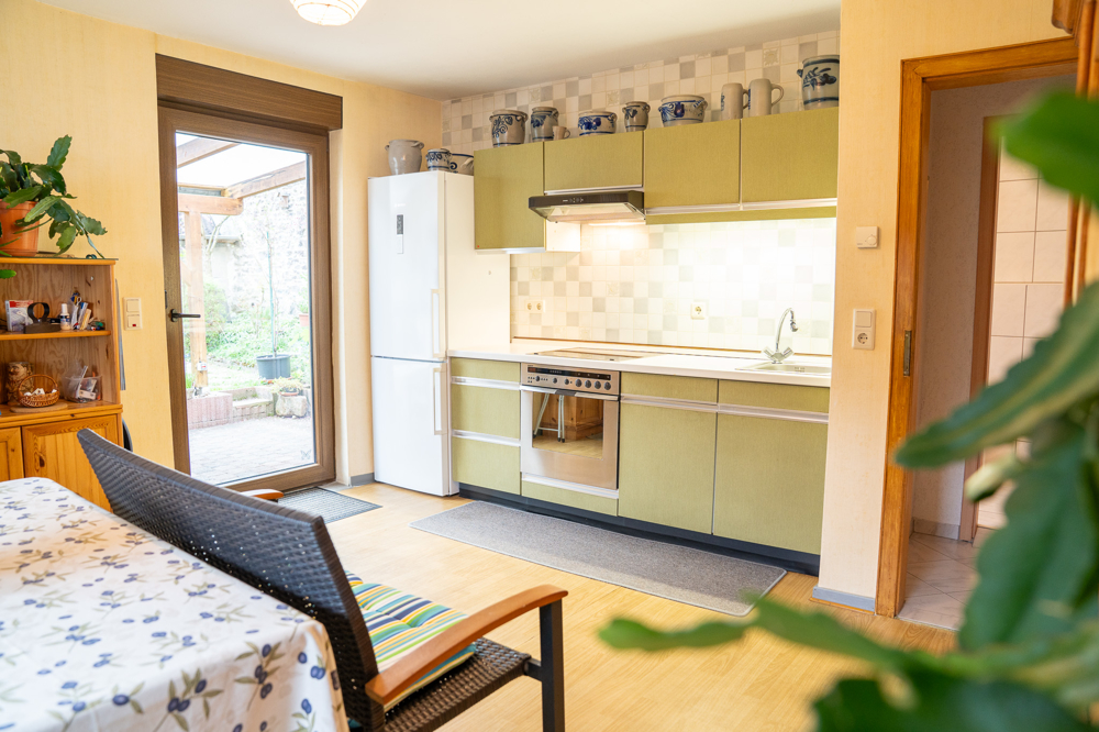 Wohnküche mit Terrassenzugang im Erdgeschoss